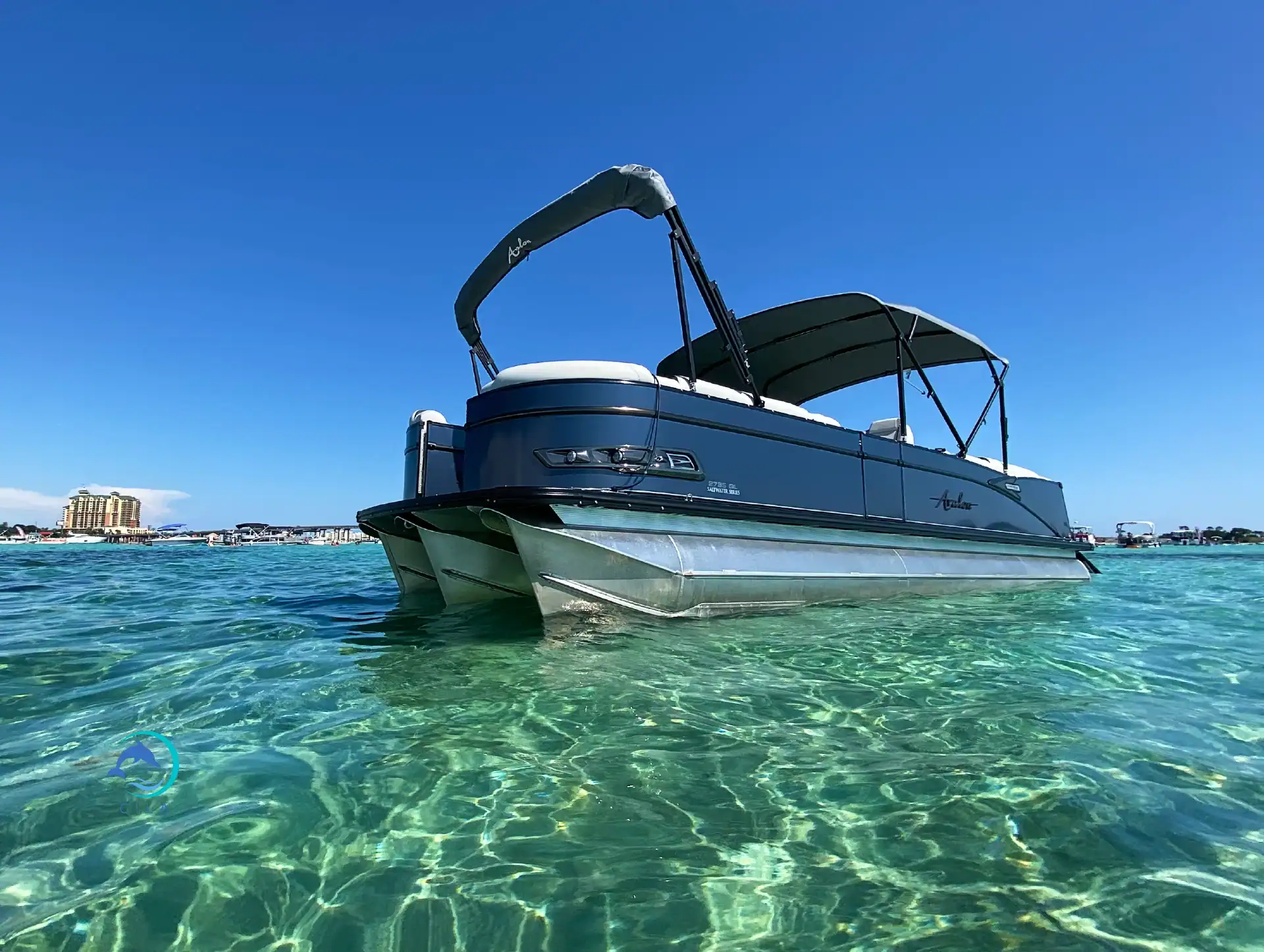 Brightly colored pontoon anchored in crystal-clear waters at Crab Island.