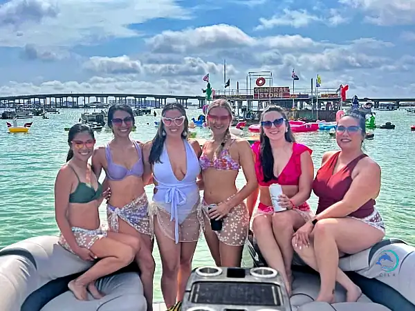 Relaxing with friends at Crab Island, crystal-clear waters and sunny skies.