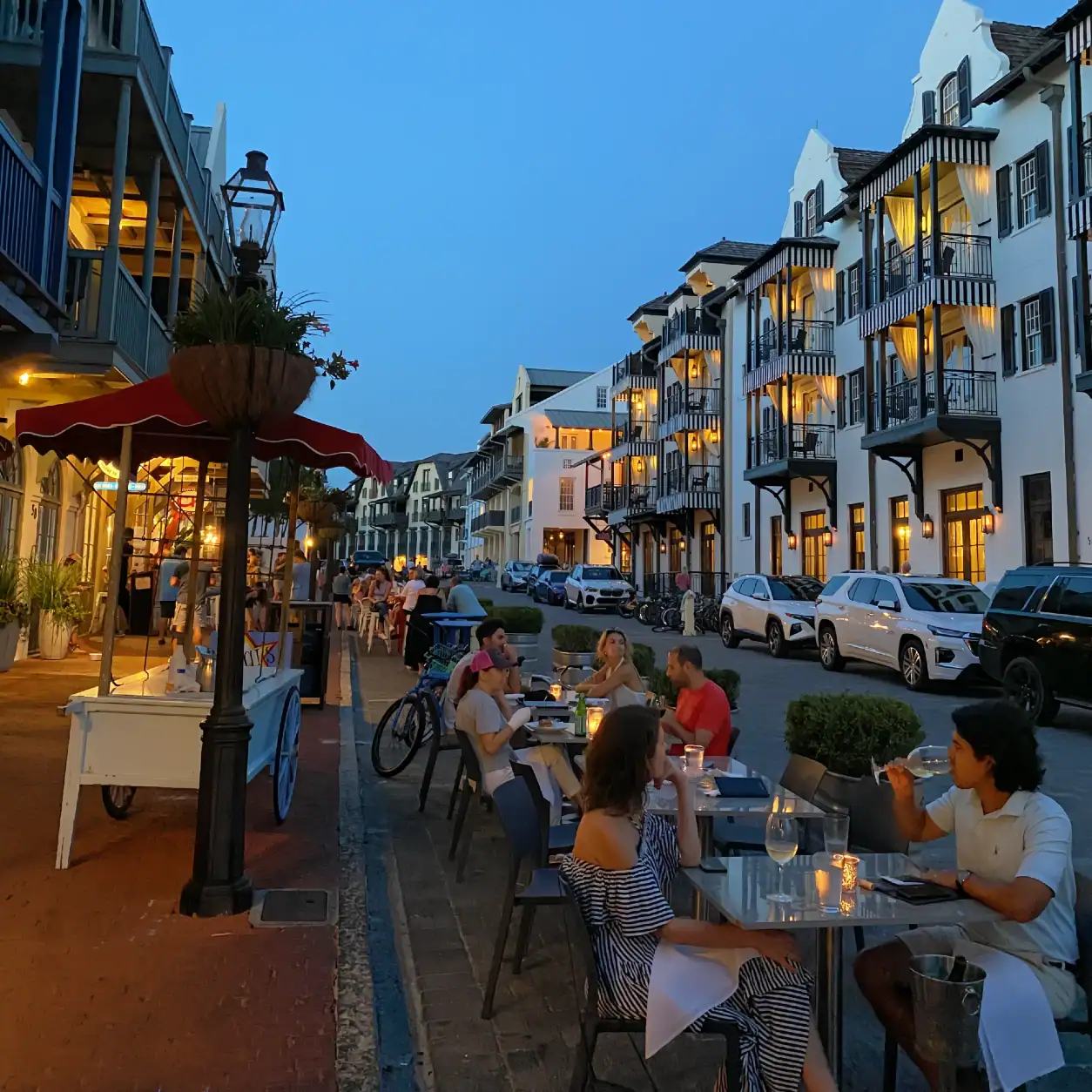 A couple having dinner on the street in Rosemary Beach