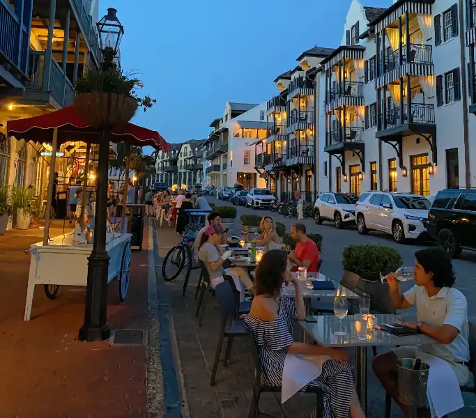 Couples having dinner outdoors in Rosemary Beach
