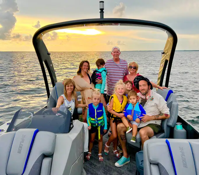 Family from 30a enjoying a sunset trip on a Pontoon with Crab Island Luxury Adventures