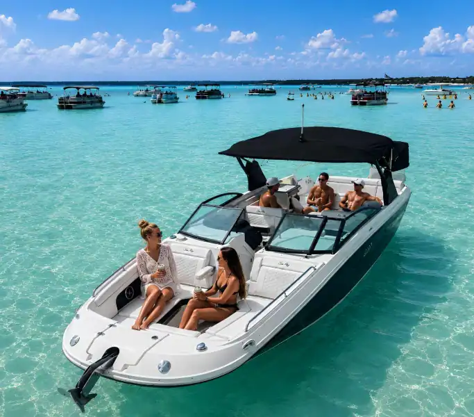 Sea Ray Sport boat with Crab Island Luxury Adventures full of a few couples at Crab Island